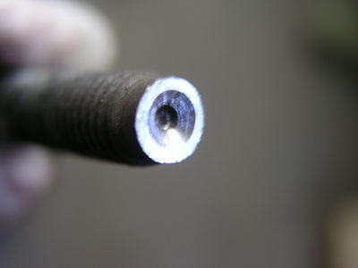 Stud Prep: Remove the slotted end of the stud and use a 3/8 drill to put a centering cone in the end.